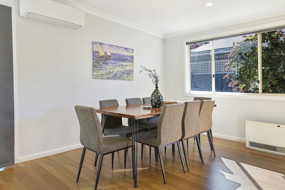 Warm dining area in a Strategic Stays property
